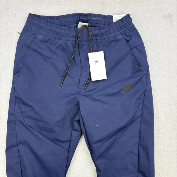 Nike Pants Mens Small Navy Sportswear Tech Essentials Commuter Woven Tapered Zip